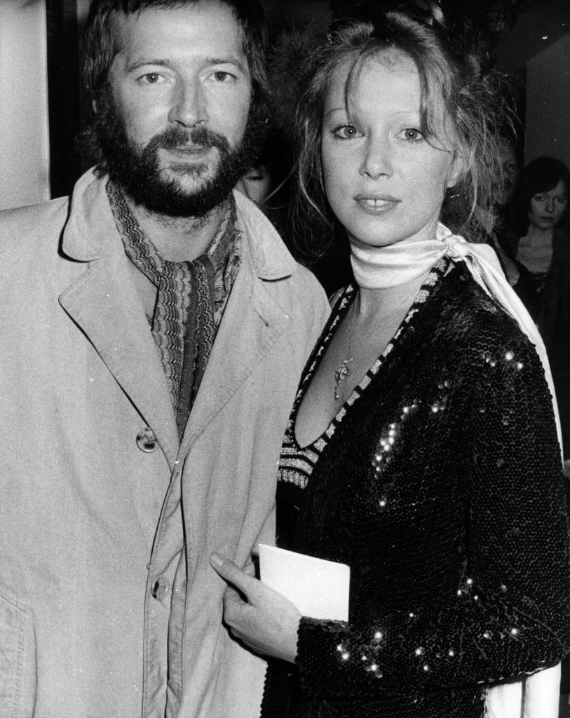 British blues-rock guitarist Eric Clapton and his girlfriend fashion model Patti Boyd, ex-wife of ex-Beatle George Harrison, pictured at the premiere of the rock musical film 'Tommy' in London's Leicester Square, 26th March 1975.