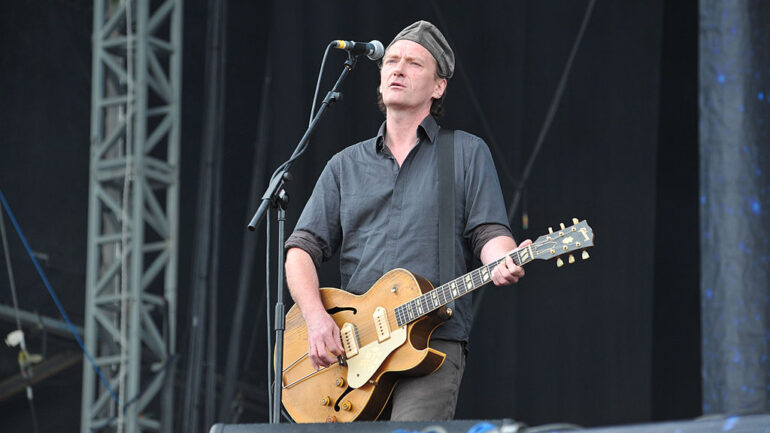 KNEBWORTH, UNITED KINGDOM - AUGUST 2: Kevin Geordie Walker of English post-punk band Killing Joke, live on stage at Sonisphere Festival, August 2, 2009