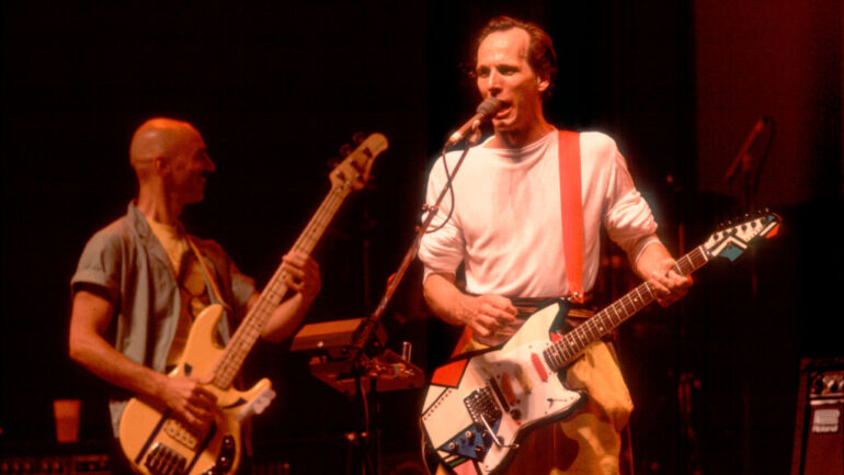 Tony Levin, left, and Adrian Belew of King Crimson At The Poplar Creek Music Theater In Hoffman Estates, Illinois, June 22, 1984