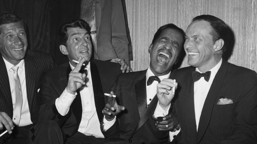 Jan Murray (L) sits alongside Rat Pack members Dean Martin, Sammy Davis Jr., and Frank Sinatra as the group unwinds backstage at Carnegie Hall after entertaining at a benefit performance in honor of Dr. Martin Luther King Jr.