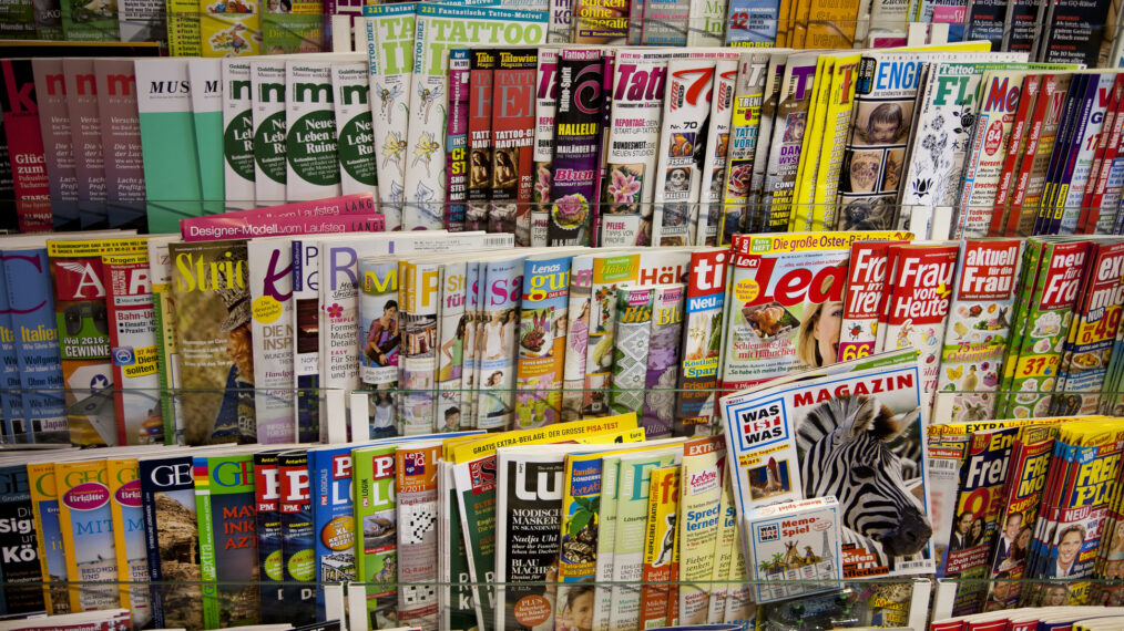Racks of German Magazines inside a news-stand in Berlin.