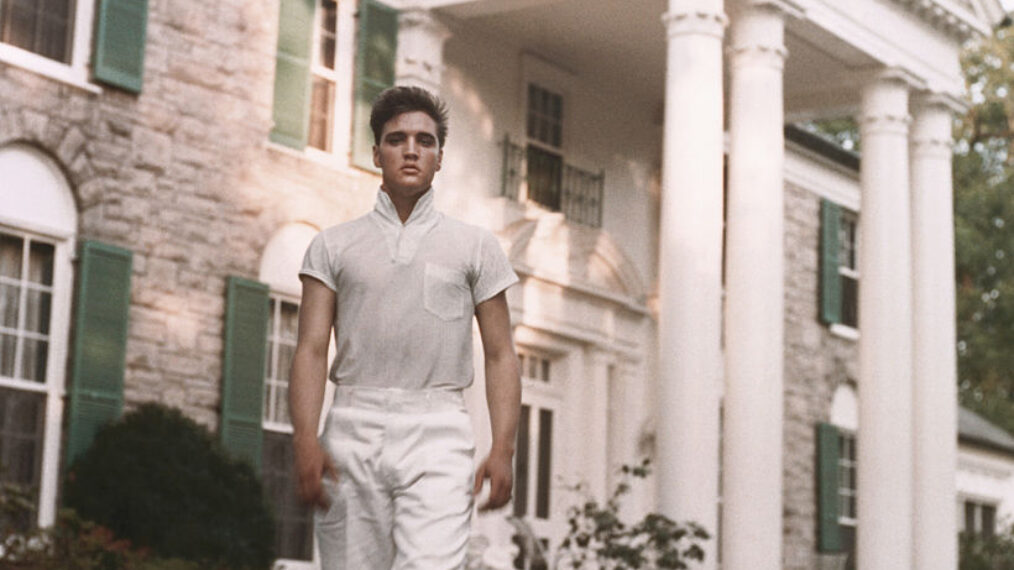 Rock and roll singer Elvis Presley strolls the grounds of his Graceland estate in circa 1957