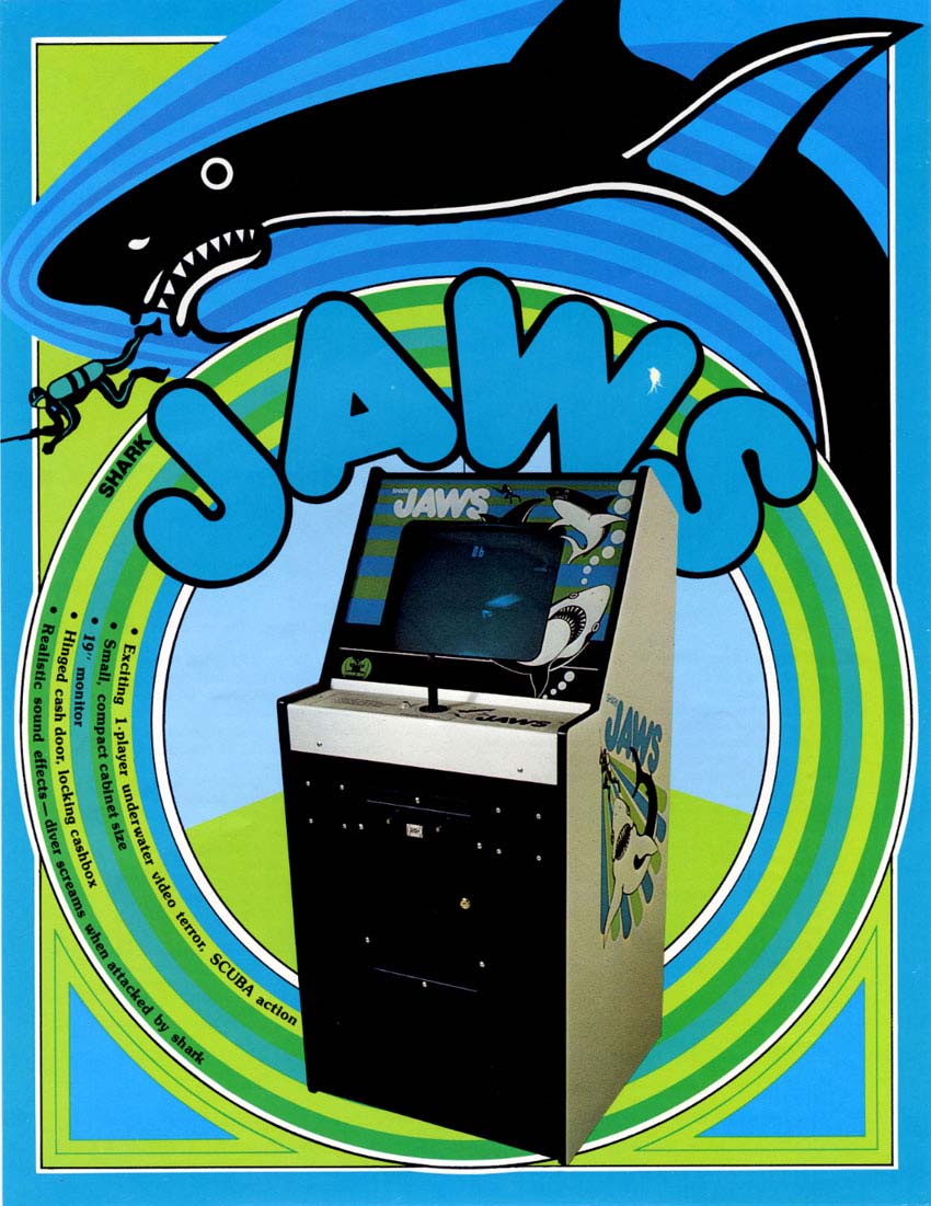 image from the cover of a 1975 flyer for the Atari arcade video game "Shark JAWS." It shows a picture of the game cabinet, surrounded by green-and-blue circles, at the top of which is an illustration of a large, black shark, just above the title of the game, "Shark JAWS."