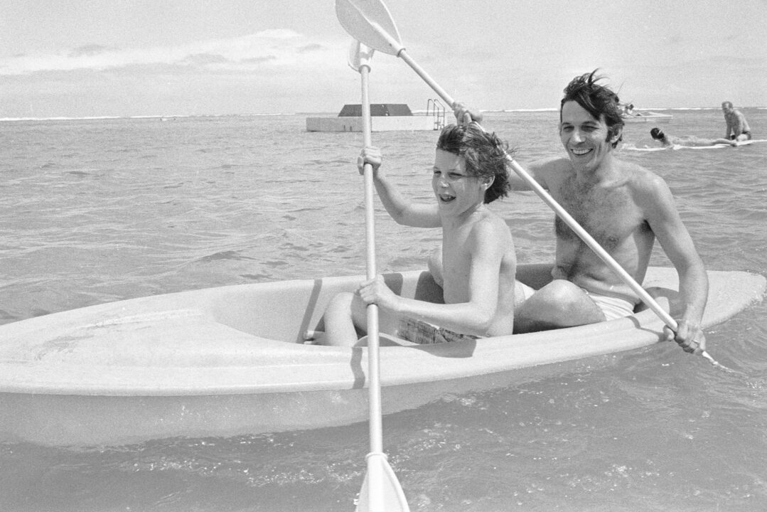 WAIKIKI - JUNE 13: 13 year-old Adam Nimoy and Leonard Nimoy, enjoying the surf at Waikiki, Hawaii. Image dated June 13, 1970. 
