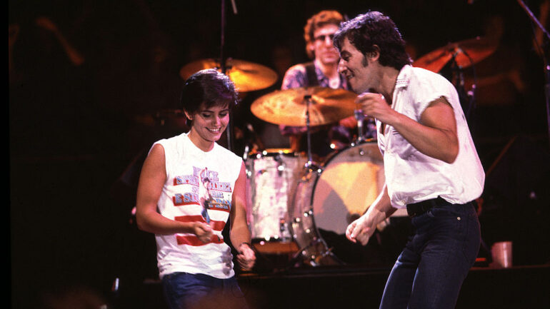 Bruce Springsteen and Courteney Cox at the filming of the video for Dancing in the Dark on 6/27/84 in Minneapolis, Mn. in Various Locations