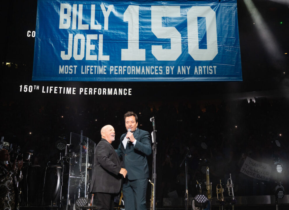 Billy Joel and Jimmy Fallon unveil a banner at his 150th show at Madison Square Garden on July 25, 2024 in New York City