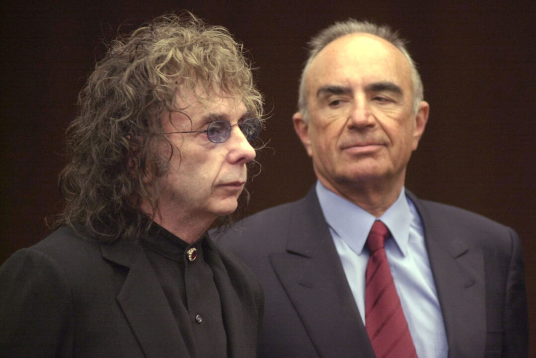 ALHAMBRA, CA - NOVEMBER 20: Legendary record producer Phil Spector (L) and attorney Robert Shapiro appear in Alhambra Superior Court for Spector's arraignment on one count of murder November 20, 2003 in Alhambra, California. Spector is charged with murdering B-movie starlet Lana Clarkson at his hilltop mansion Februay 3. Spector, the 1960s recording-studio wizard who created the ``Wall of Sound'' style of recording and worked with such stars as The Beatles, The Ronettes and Ike and Tina Turner, pleaded innocent at the arraignment. 