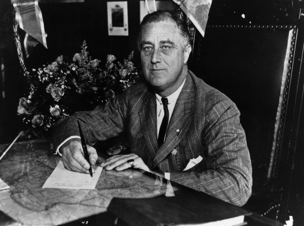 1936: Franklin Delano Roosevelt (1882 - 1945) the 32nd President of the United States from 1933-45. A Democrat, he led his country through the depression of the 1930's and World War II, and was elected for an unprecedented fourth term of office in 1944. 