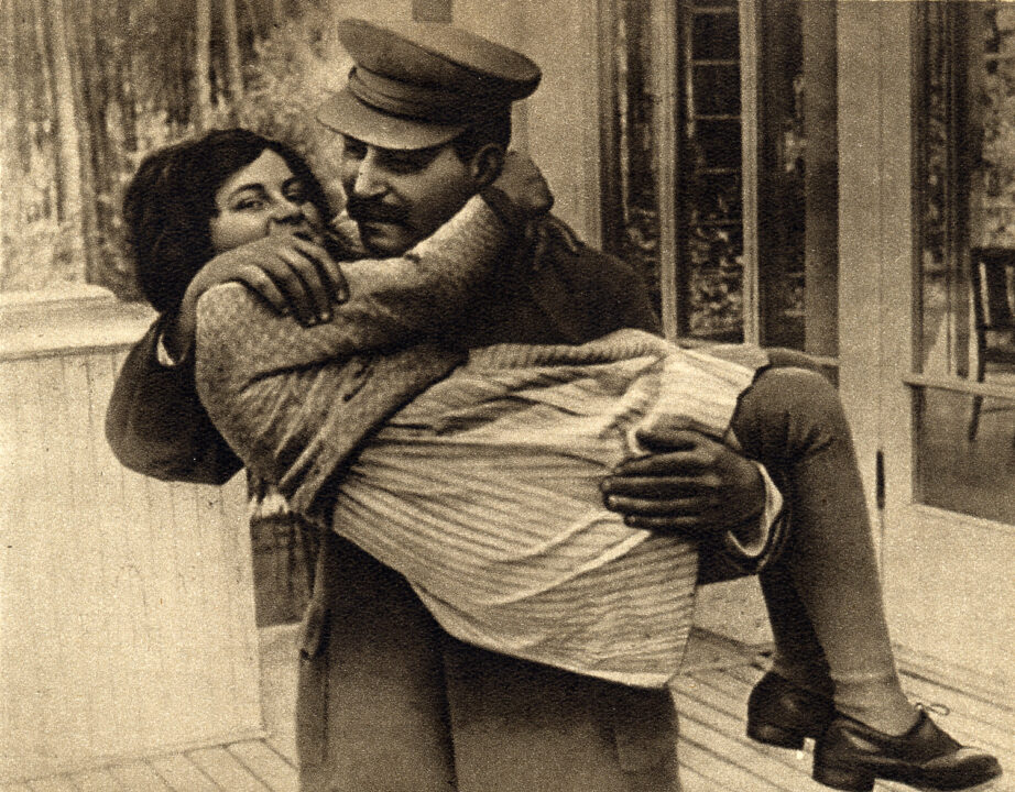 Young Svetlana Stalina being carried by her father in 1935