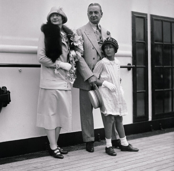 (Original Caption) Off on Long Needed Holiday Trip: Forsaking thoughts of chorus beauties, Florenz Ziegfeld and wife an daughter, Billie Burke and Patricia, 9, sailed today, Saturday July 25, for Paris and Deaville, France. It was Flo's first trip across the Atlantic since marriage, and his wife claims this as their real honeymoon. They sailed aboard the liner Majestic.