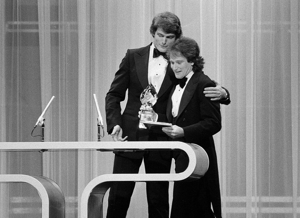 Christopher Reeve presenting Robin Williams of "Mork and Mindy" with the Favorite Male Performer in a New TV Program on the 1979 People's Choice Awards show. Image dated March 8, 1979