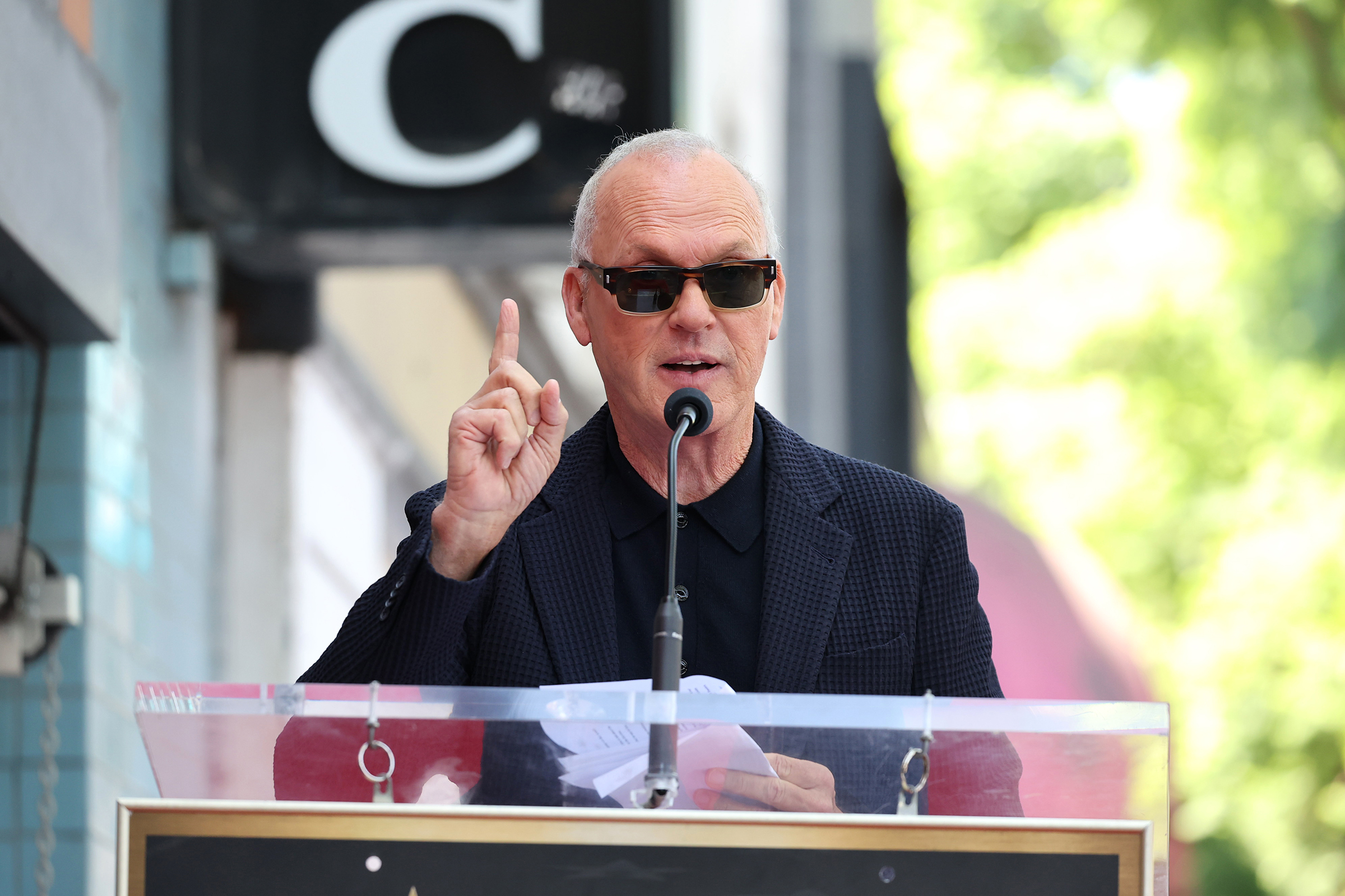 HOLLYWOOD, CALIFORNIA - SEPTEMBER 03: Michael Keaton attends Tim Burton honored with star on Hollywood Walk of Fame on September 03, 2024 in Hollywood, California.