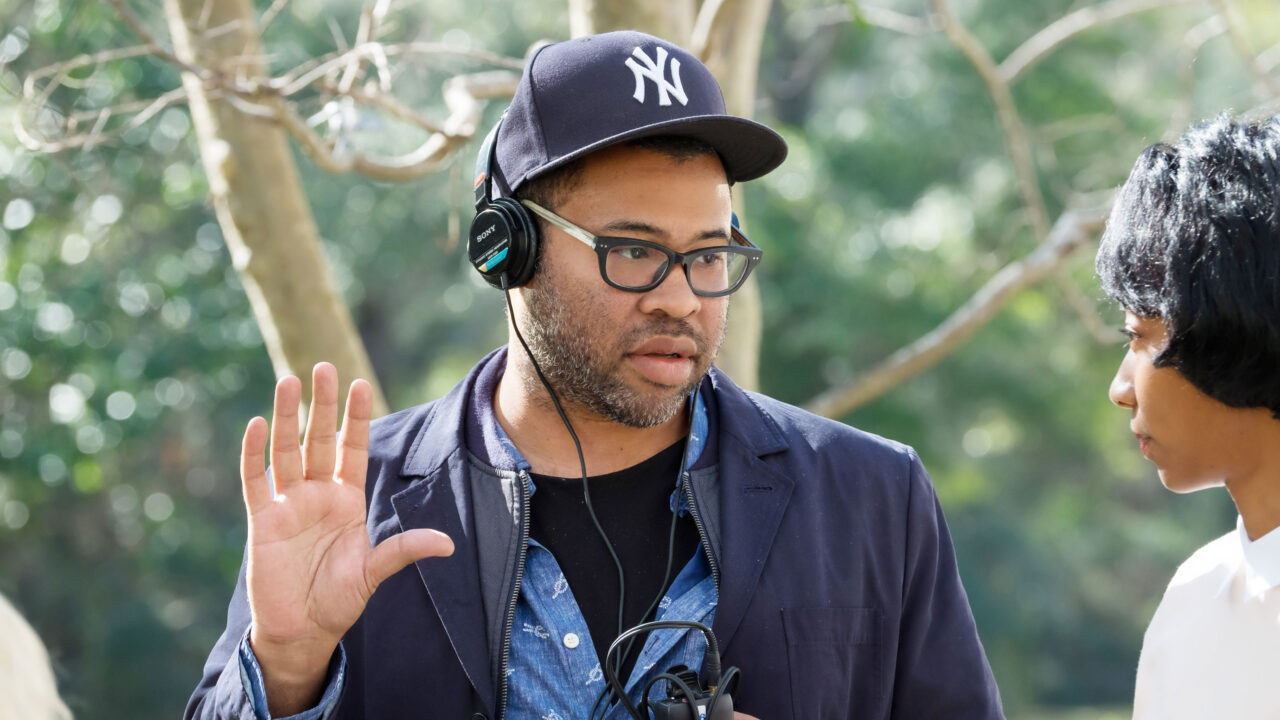 GET OUT, from left: director Jordan Peele, Betty Gabriel, on set, 2017. ph: Justin Lubin. 