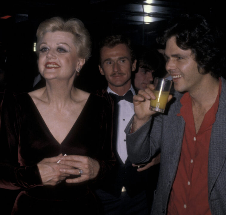 Actress Angela Lansbury, husband Peter Shaw and son Anthony Shaw attend Ruby Awards on December 16, 1979 at New York New York Disco in New York City. (Photo by Ron Galella/Ron Galella Collection via Getty Images)