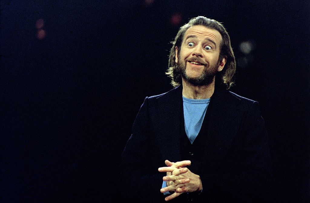 SATURDAY NIGHT LIVE -- Episode 1 -- Air Date 10/11/1975 -- Pictured: Host George Carlin during the monologue on October 11, 1975