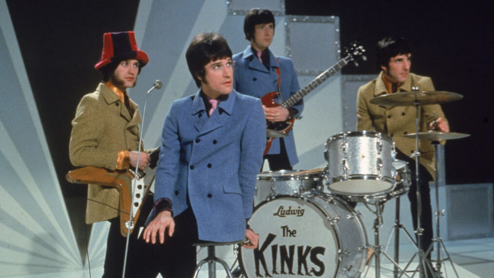 The Kinks, (L-R) Dave Davies, Ray Davies, Peter Quaife, and Mick Avory, wait on the set of a television show, ready to perform, 1968