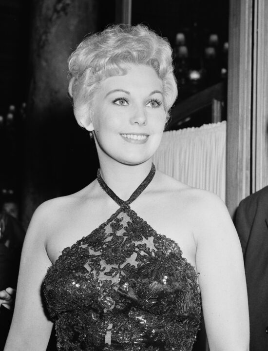 American actress Kim Novak at a nightclub in Cannes, France, during the Cannes Film Festival, 27th April 1956. 