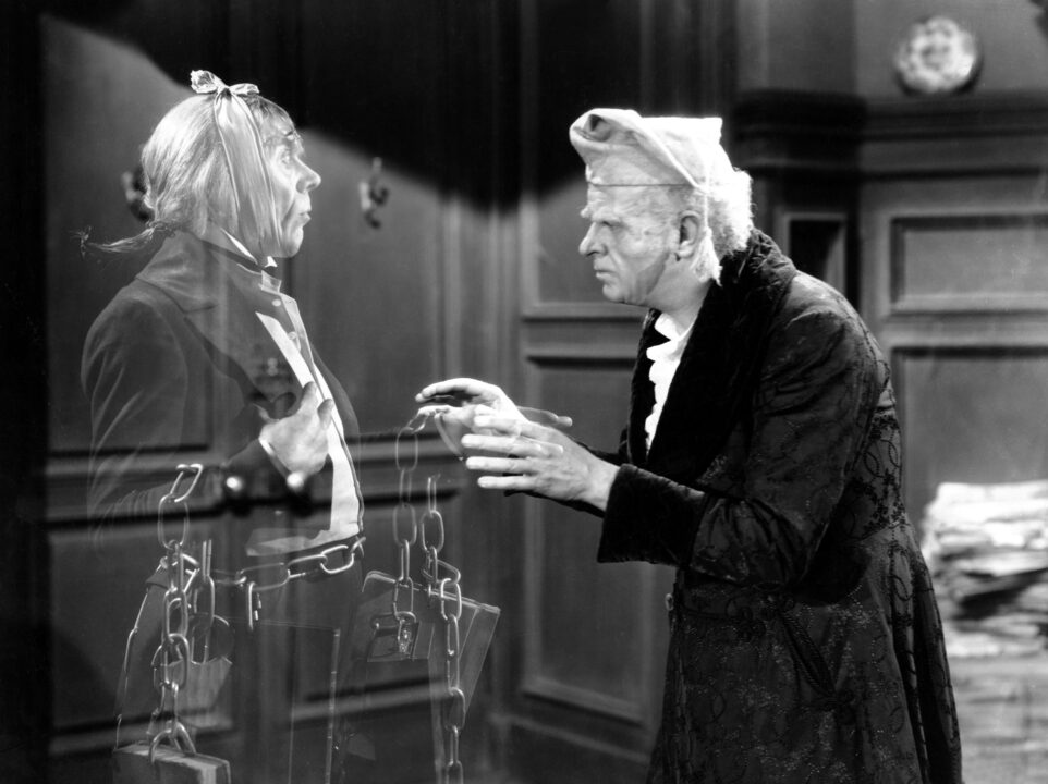 A CHRISTMAS CAROL, Leo G. Carroll (Morley's Ghost), Reginald Owen (Ebenezer Scrooge), 1938.