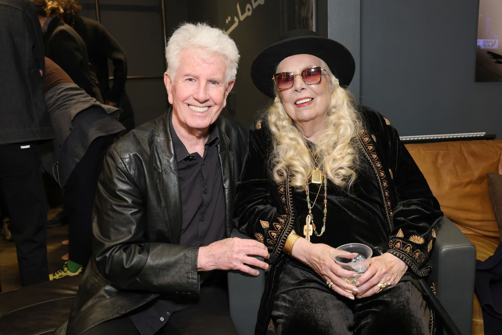 Graham Nash and Joni Mitchell attend the FIREAID Benefit Concert for California Fire Relief at The Kia Forum on January 30, 2025 in Inglewood, California