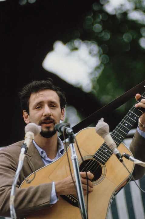 American singer and songwriter Peter Yarrow performing at the Newport Folk Festival at Freebody Park on Rhode Island, USA, 23rd-26th July 1964