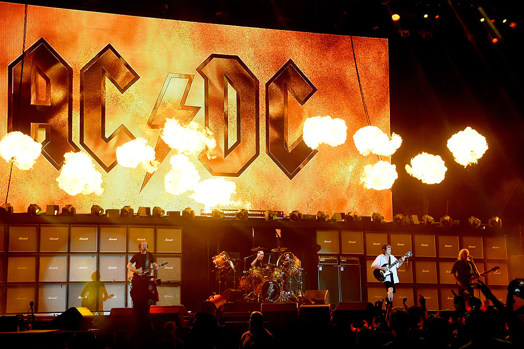 Singer Brian Johnson (L) and musician Angus Young of AC/DC perform onstage during day 1 of the 2015 Coachella Valley Music And Arts Festival (Weekend 2) at The Empire Polo Club on April 17, 2015 in Indio, California