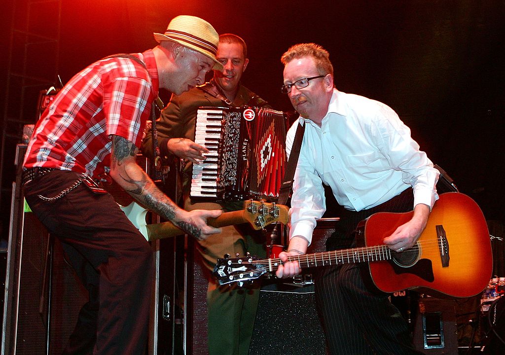 Flogging Molly's Nathen Maxwell, Matt Hensley and Dave King, perform at the Red White & Boom Independence Day festival at Desert Breeze Park July 3, 2006 in Las Vegas, Nevada